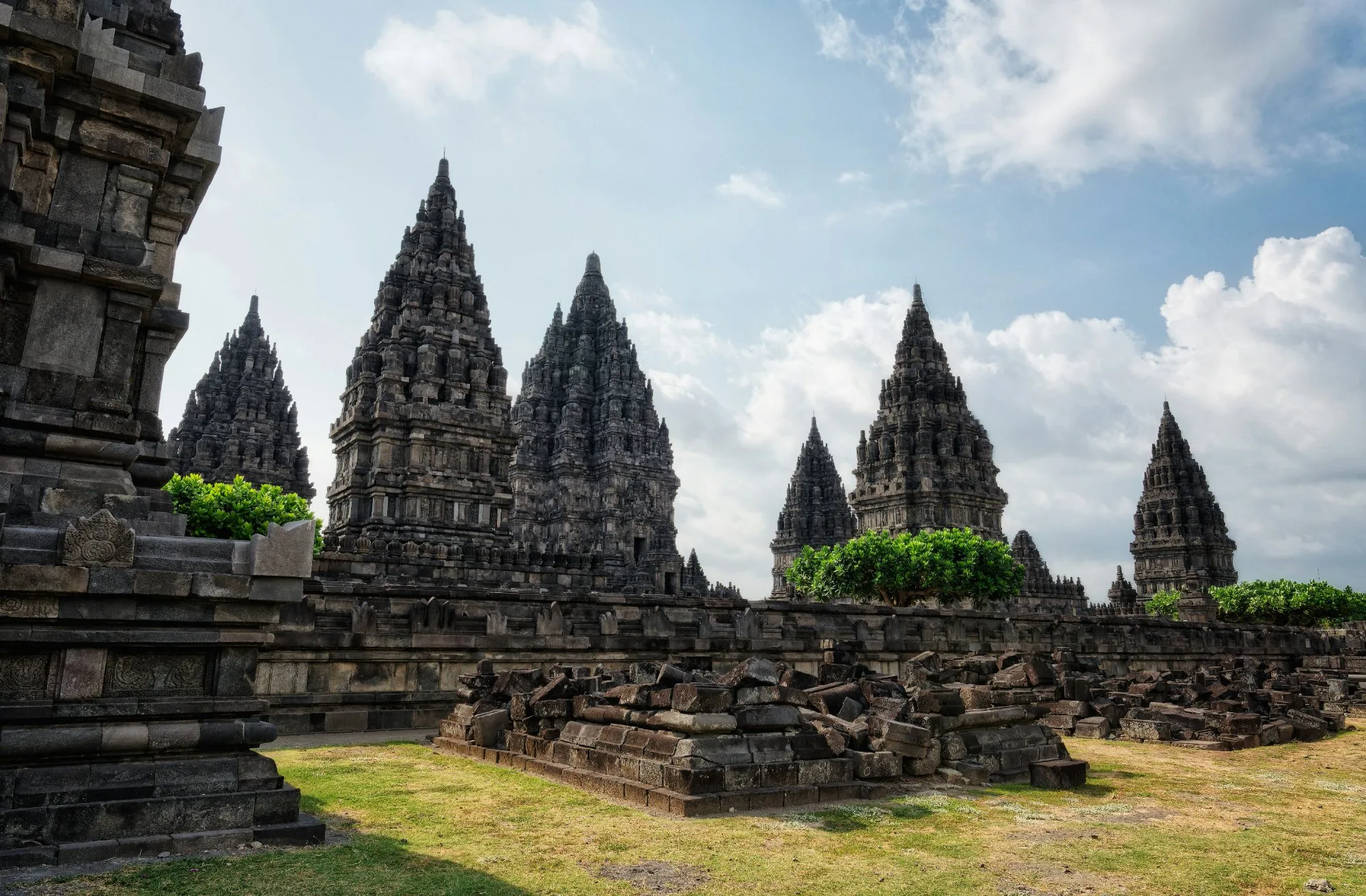 Prambanan Hindu temple spires against a blue sky, near Yogyakarta